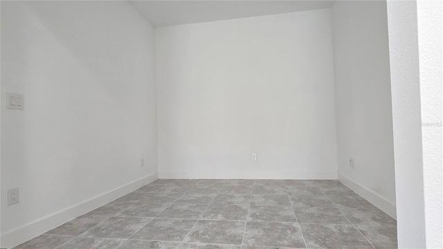 726 Coral Reef Way, Daytona Beach, FL 32124 - unfurnished room with baseboards and light stone finish flooring