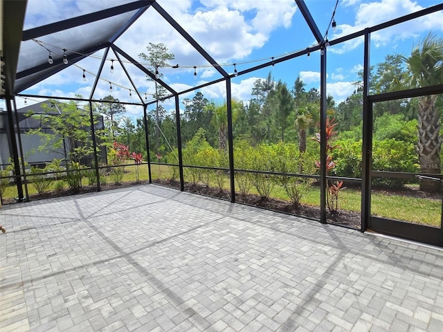 726 Coral Reef Way, Daytona Beach, FL 32124 - view of patio / terrace with a lanai