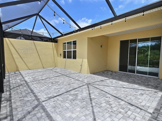 726 Coral Reef Way, Daytona Beach, FL 32124 - view of patio / terrace featuring glass enclosure