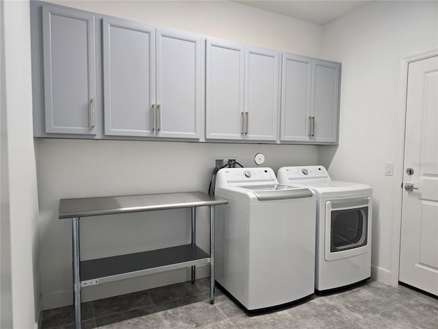 726 Coral Reef Way, Daytona Beach, FL 32124 - washroom featuring washer and dryer, cabinet space, and baseboards