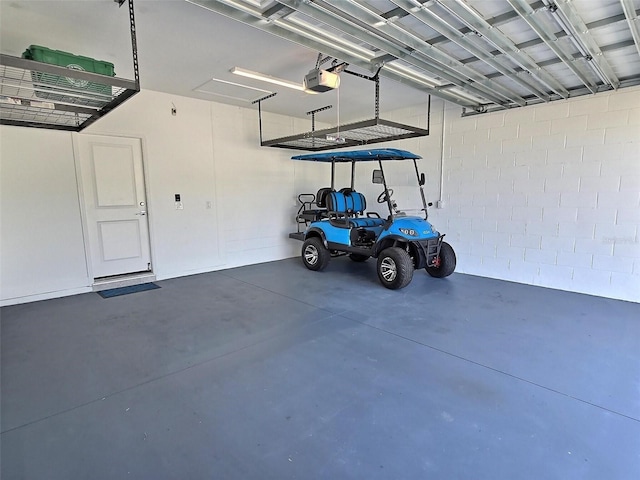 726 Coral Reef Way, Daytona Beach, FL 32124 - garage featuring a garage door opener