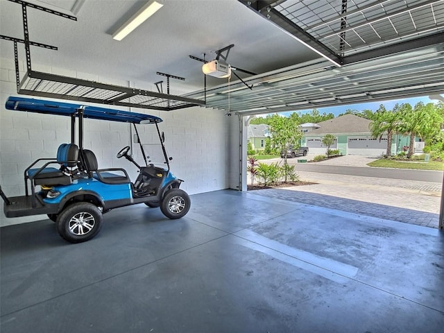 726 Coral Reef Way, Daytona Beach, FL 32124 - garage with a garage door opener