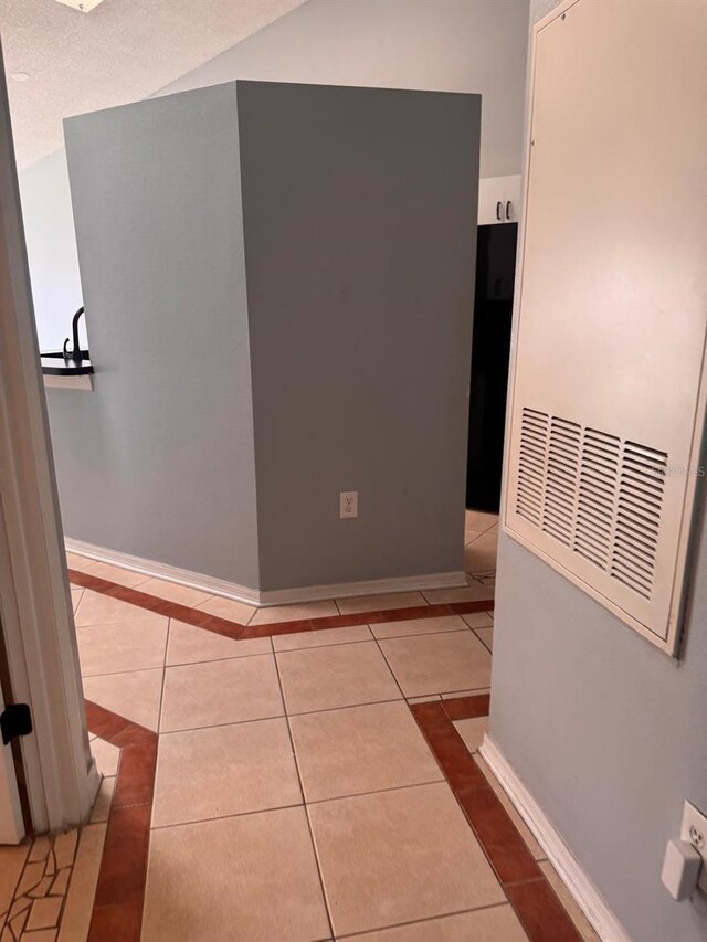 1603 Emily Ct, Kissimmee, FL 34744 - unfurnished room featuring tile patterned flooring and inlaid floor details