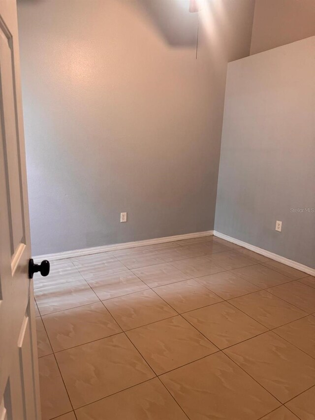 1603 Emily Ct, Kissimmee, FL 34744 - spare room with baseboards