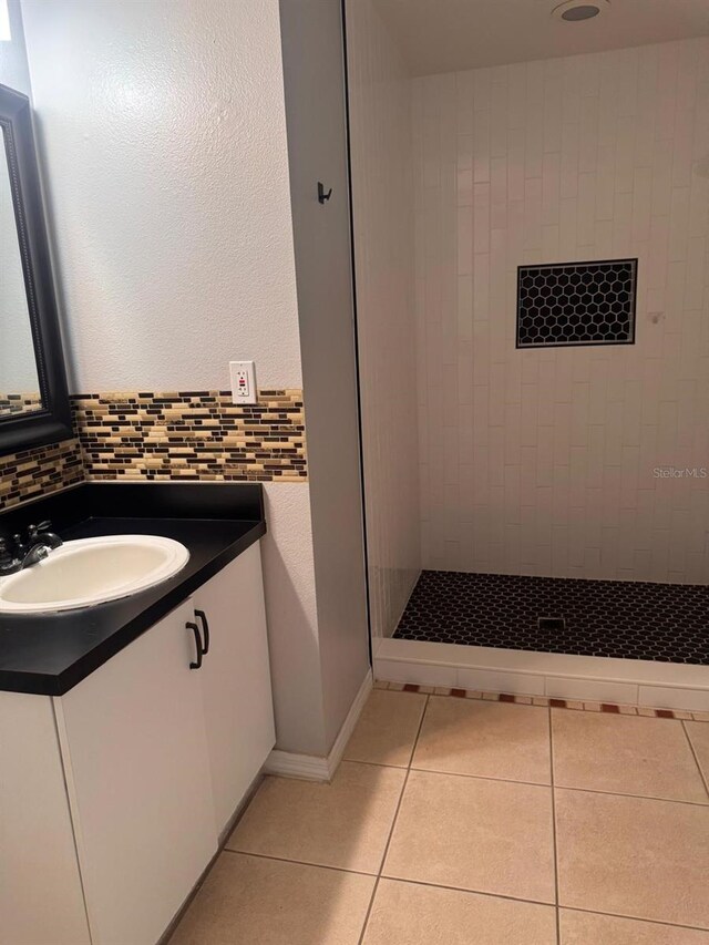 1603 Emily Ct, Kissimmee, FL 34744 - bathroom with vanity, tile patterned floors, and a stall shower