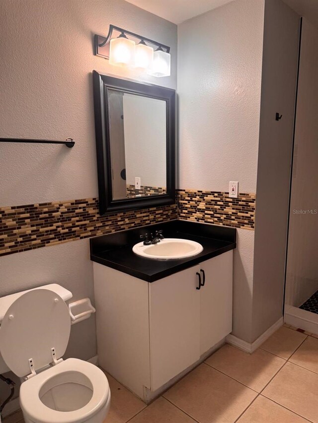 1603 Emily Ct, Kissimmee, FL 34744 - bathroom with vanity, tile patterned flooring, and a shower stall
