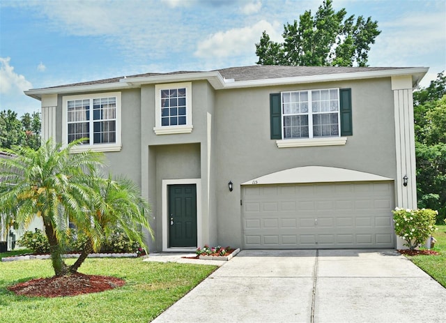 115 Bristol Forest Trl, Sanford, FL 32771 - view of front of house featuring driveway, stucco siding, and an attached garage