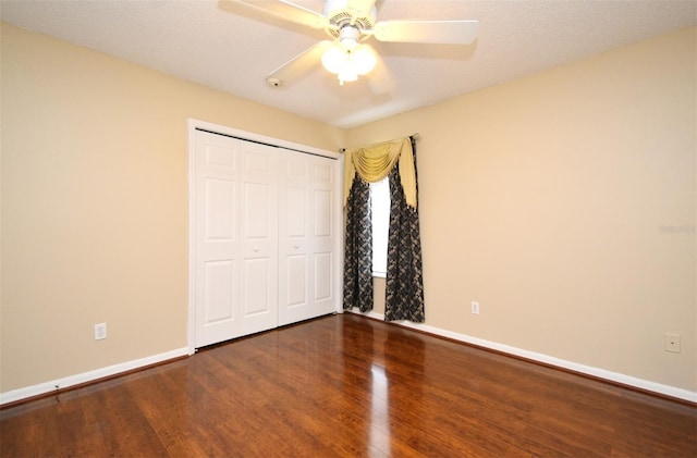 115 Bristol Forest Trl, Sanford, FL 32771 - unfurnished bedroom featuring wood finished floors, baseboards, a closet, and a ceiling fan