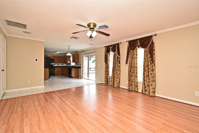 115 Bristol Forest Trl, Sanford, FL 32771 - unfurnished living room with a ceiling fan, ornamental molding, light wood-style flooring, baseboards, and a textured ceiling