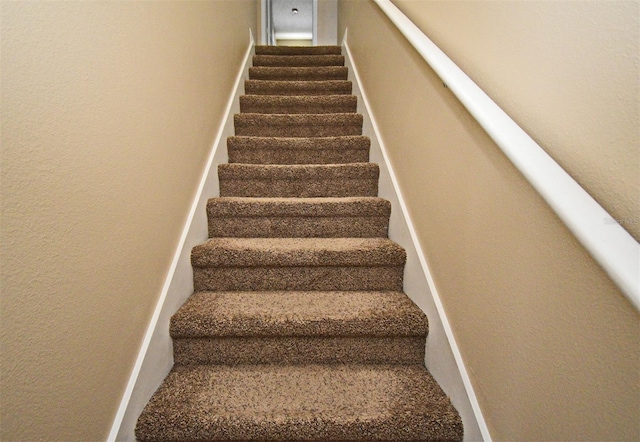 115 Bristol Forest Trl, Sanford, FL 32771 - stairs featuring a textured wall