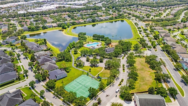 12917 Grovehurst Ave, Winter Garden, FL 34787 - aerial view of residential area with a large body of water and a pool area