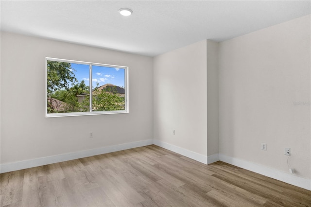 12917 Grovehurst Ave, Winter Garden, FL 34787 - spare room with wood finished floors and baseboards