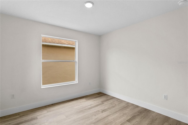 12917 Grovehurst Ave, Winter Garden, FL 34787 - unfurnished room featuring wood finished floors and baseboards