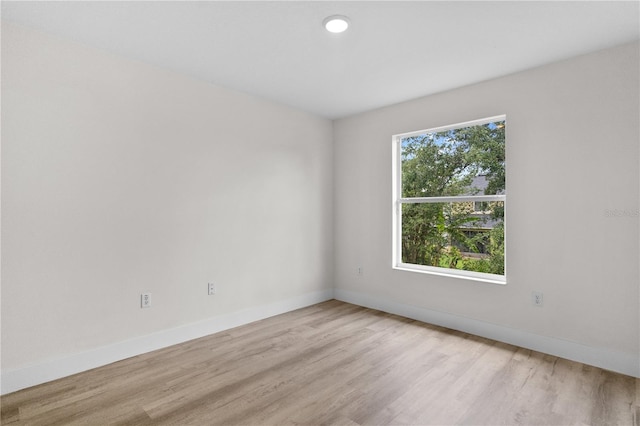 12917 Grovehurst Ave, Winter Garden, FL 34787 - empty room featuring light wood-style floors and baseboards