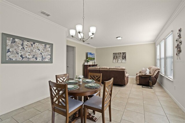 1553 Caterpillar St, Saint Cloud, FL 34771 - dining space with light tile patterned floors, crown molding, a chandelier, and baseboards