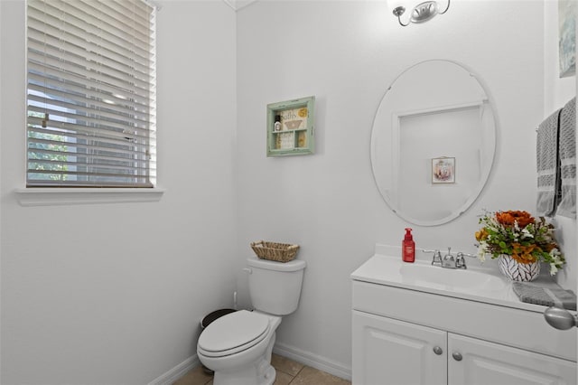 1553 Caterpillar St, Saint Cloud, FL 34771 - half bath featuring vanity, toilet, tile patterned flooring, and baseboards
