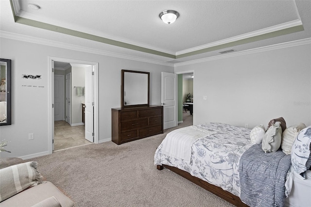 1553 Caterpillar St, Saint Cloud, FL 34771 - carpeted bedroom with crown molding, a tray ceiling, and baseboards