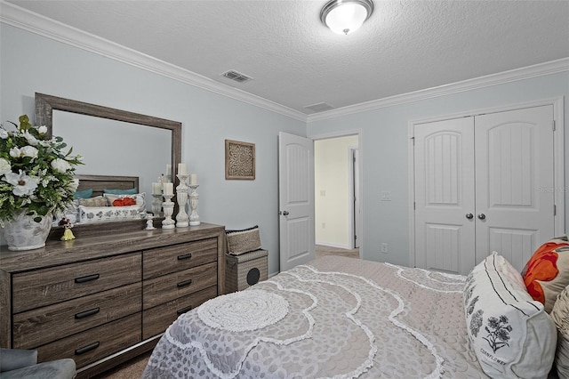 1553 Caterpillar St, Saint Cloud, FL 34771 - bedroom with ornamental molding, a textured ceiling, a closet, and dark colored carpet