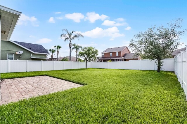 1553 Caterpillar St, Saint Cloud, FL 34771 - view of yard with a patio