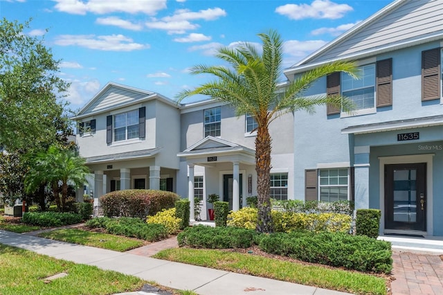 11631 Mystery Ln, Orlando, FL 32832 - view of property with stucco siding