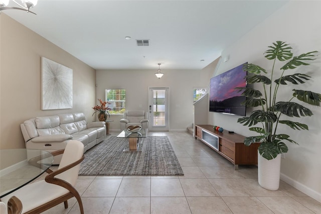 11631 Mystery Ln, Orlando, FL 32832 - living area with baseboards and light tile patterned floors