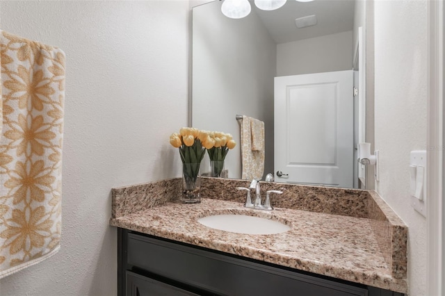 11631 Mystery Ln, Orlando, FL 32832 - bathroom featuring vanity and a textured wall