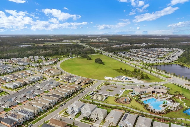 11631 Mystery Ln, Orlando, FL 32832 - aerial overview of property's location with nearby suburban area, a pool, and a nearby body of water