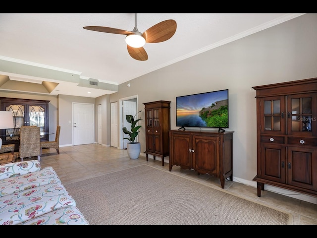 1064 N Tamiami Trl Unit 1219, Sarasota, FL 34236 - living room featuring light tile patterned floors, ceiling fan, crown molding, and baseboards