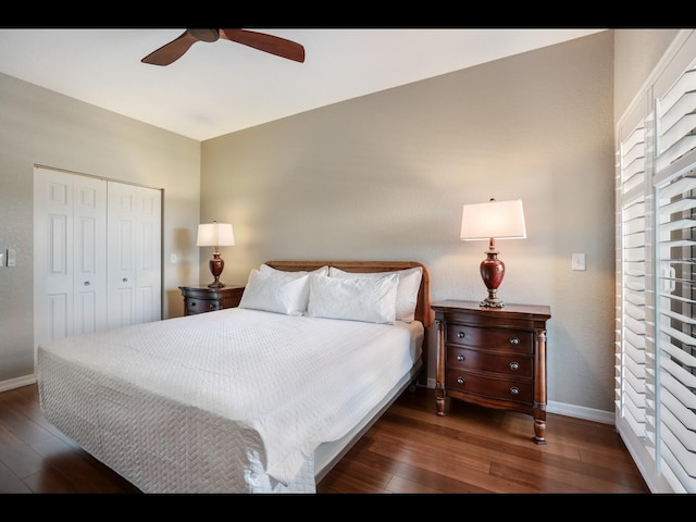 1064 N Tamiami Trl Unit 1219, Sarasota, FL 34236 - bedroom featuring wood finished floors, baseboards, a closet, and ceiling fan