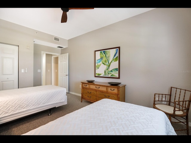 1064 N Tamiami Trl Unit 1219, Sarasota, FL 34236 - carpeted bedroom with ceiling fan and baseboards