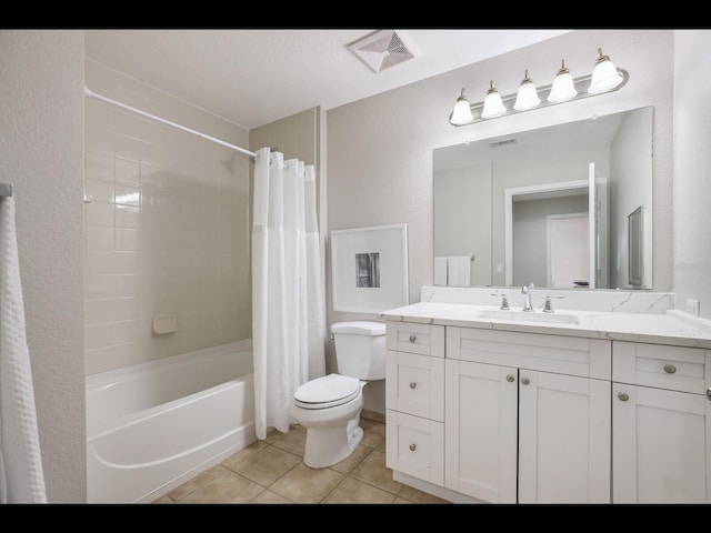 1064 N Tamiami Trl Unit 1219, Sarasota, FL 34236 - bathroom with tile patterned floors, toilet, shower / bathtub combination with curtain, and vanity