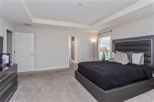 871 Orleans Dr, Eagle Lake, FL 33839 - carpeted bedroom with a raised ceiling and baseboards