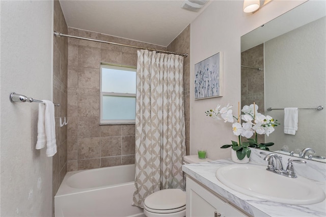 871 Orleans Dr, Eagle Lake, FL 33839 - bathroom featuring toilet, shower / bath combo with shower curtain, and vanity