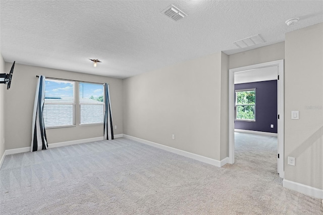10249 Spring Lake Dr, Clermont, FL 34711 - carpeted spare room featuring a textured ceiling and a smoke detector