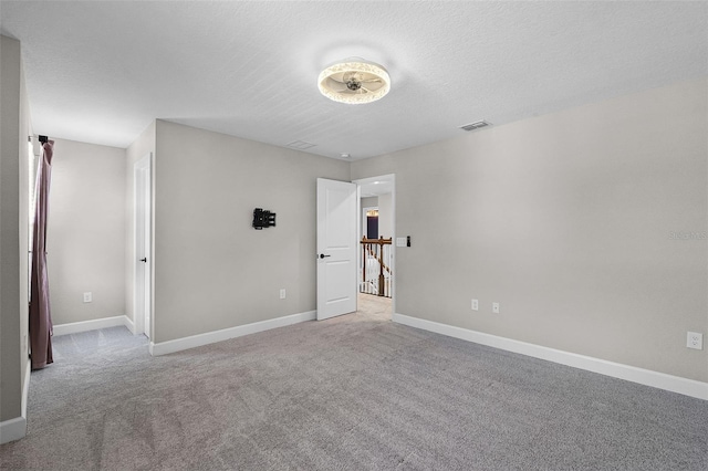 10249 Spring Lake Dr, Clermont, FL 34711 - unfurnished bedroom featuring carpet floors and baseboards