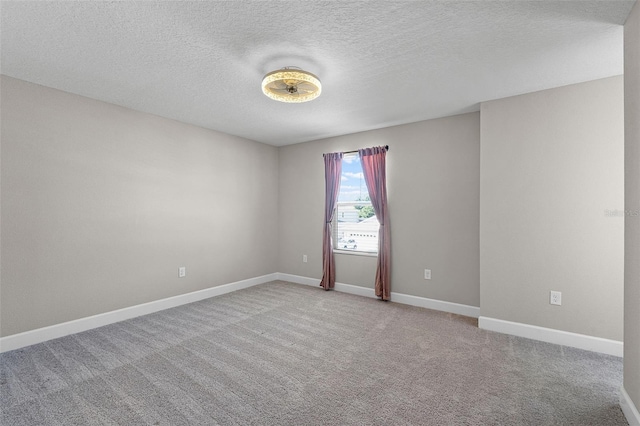 10249 Spring Lake Dr, Clermont, FL 34711 - carpeted empty room featuring baseboards and a textured ceiling