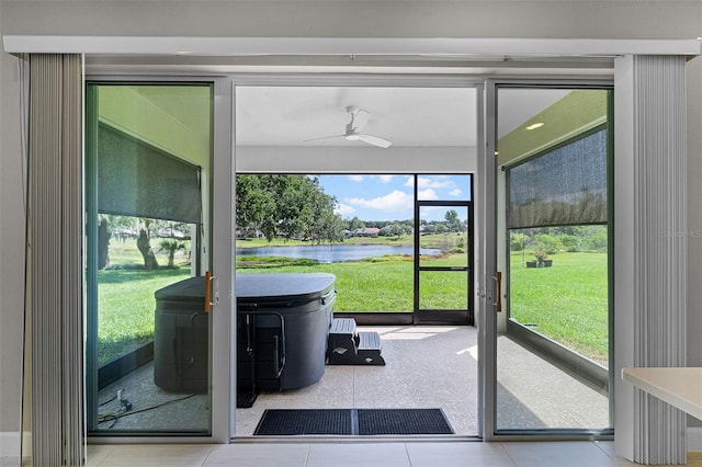 10249 Spring Lake Dr, Clermont, FL 34711 - entryway featuring a water view and ceiling fan