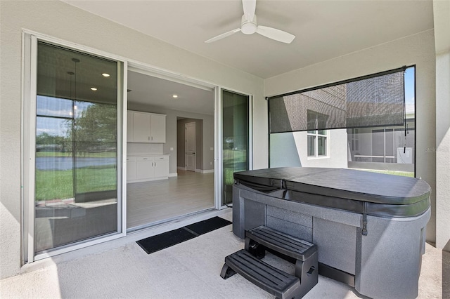 10249 Spring Lake Dr, Clermont, FL 34711 - view of patio with a hot tub and ceiling fan