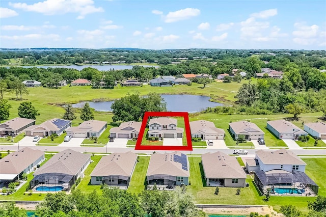 10249 Spring Lake Dr, Clermont, FL 34711 - aerial view of residential area with a large body of water and property boundaries highlighted