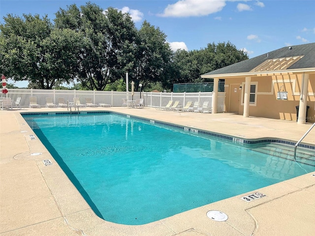 10249 Spring Lake Dr, Clermont, FL 34711 - community pool with a patio