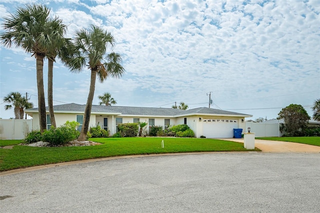 2 Pirates Cv, Ormond Beach, FL 32176 - ranch-style home with concrete driveway, a garage, and stucco siding