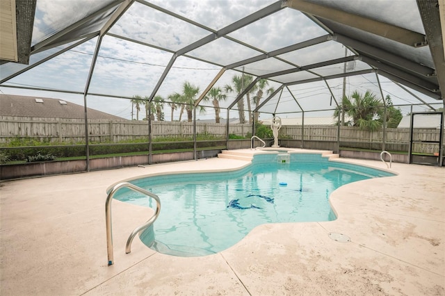 2 Pirates Cv, Ormond Beach, FL 32176 - view of pool with a patio, a fenced backyard, a pool with connected hot tub, and glass enclosure