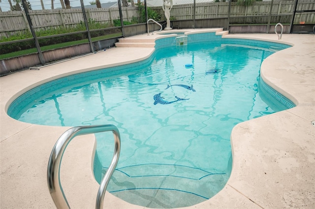 2 Pirates Cv, Ormond Beach, FL 32176 - view of pool featuring fence, a patio area, and a pool with connected hot tub