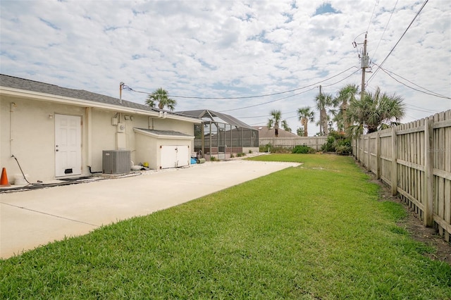 2 Pirates Cv, Ormond Beach, FL 32176 - view of yard with central air condition unit, a patio, and concrete driveway