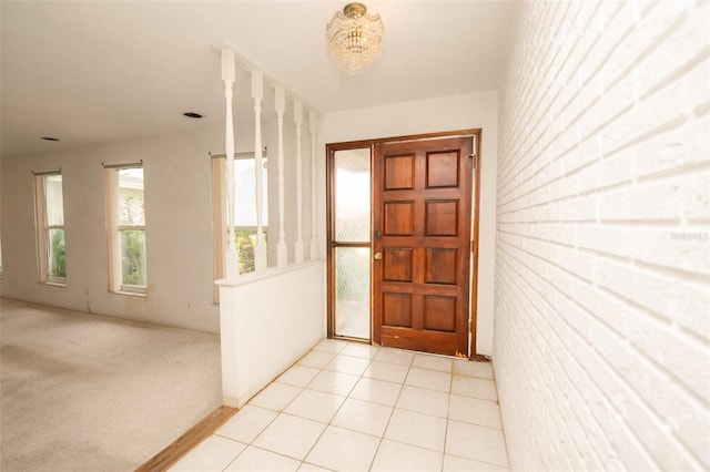 2 Pirates Cv, Ormond Beach, FL 32176 - foyer featuring brick wall