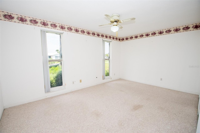 2 Pirates Cv, Ormond Beach, FL 32176 - empty room with carpet floors and ceiling fan