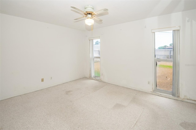 2 Pirates Cv, Ormond Beach, FL 32176 - carpeted spare room featuring healthy amount of natural light and a ceiling fan