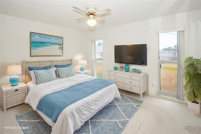 2 Pirates Cv, Ormond Beach, FL 32176 - carpeted bedroom featuring a ceiling fan