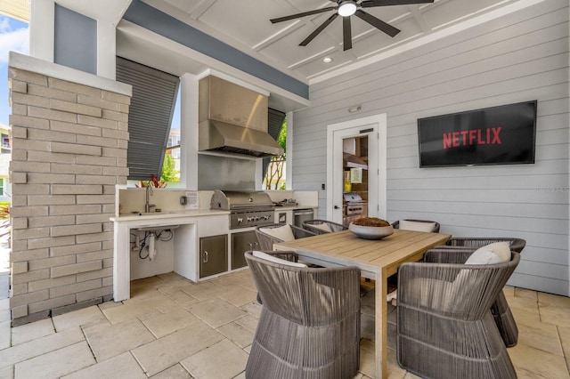 7573 Laureate Blvd Unit 1-404, Orlando, FL 32827 - view of patio featuring a ceiling fan, outdoor dining space, and a sink