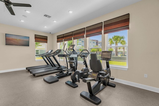 7573 Laureate Blvd Unit 1-404, Orlando, FL 32827 - gym with baseboards, ceiling fan, and recessed lighting